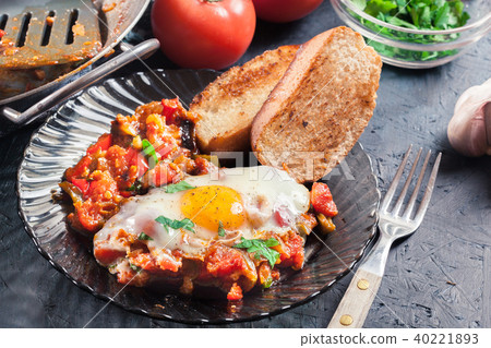 Portion of shakshuka on a plate Portion of shakshuka on a plate 40221893