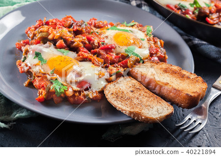 Portion of shakshuka on a plate Portion of shakshuka on a plate 40221894