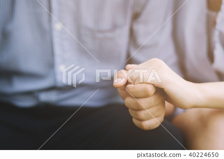 Woman and man holding hands Woman and man holding hands 40224650