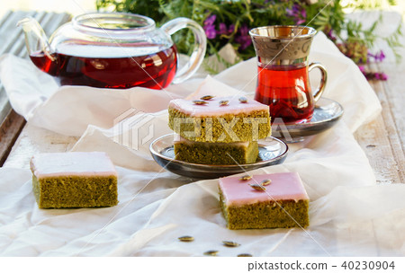 Matcha green tea cakes with white chocolate glaze 40230904