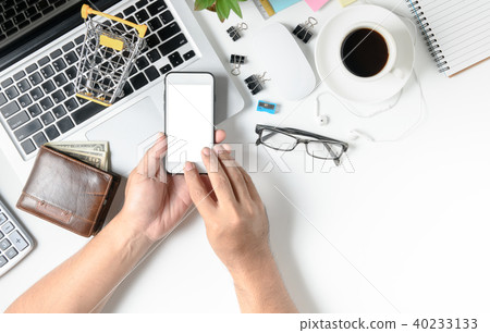 Business man using mobile phone shopping online Business man using mobile phone shopping online 40233133