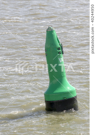 Green buoy as a marker for shipping. Green buoy as a marker for shipping. 40244950