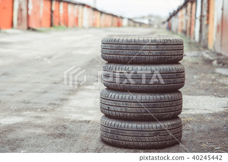 car tire with alloy wheel lies 40245442