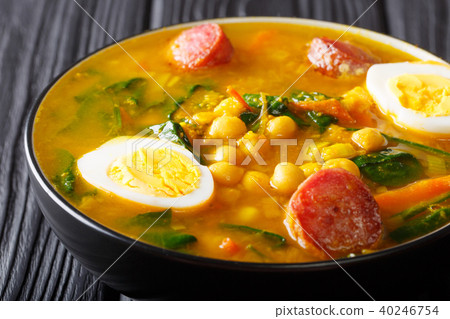 Spicy soup with spinach, chickpeas, chorizo Spicy soup with spinach, chickpeas, chorizo 40246754