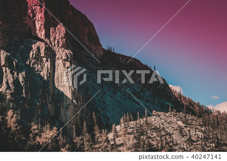 Gently sloping hills and pastel colors.  40247141