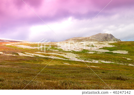 Gently sloping hills and pastel colors. Gently sloping hills and pastel colors. 40247142