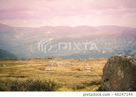 Gently sloping hills and pastel colors. Gently sloping hills and pastel colors. 40247144
