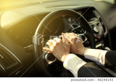 The girl clicks on the car signal The girl clicks on the car signal 40249143