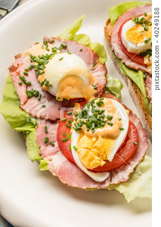 Sandwich with tomatoes, eggs and lettuce. Sandwich with tomatoes, eggs and lettuce. 40249188