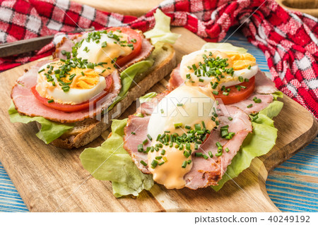 Sandwich with tomatoes, eggs and lettuce. Sandwich with tomatoes, eggs and lettuce. 40249192