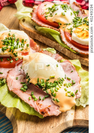 Sandwich with tomatoes, eggs and lettuce. Sandwich with tomatoes, eggs and lettuce. 40249194