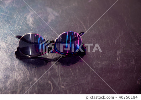 The reflection of blue and pink light at the surfaces. The atmosphere of the club, the parties The reflection of blue and pink light at the surfaces. The atmosphere of the club, the parties 40250184