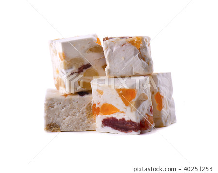 Nut nougat with dried fruit, sweet candy isolated on white background 40251253