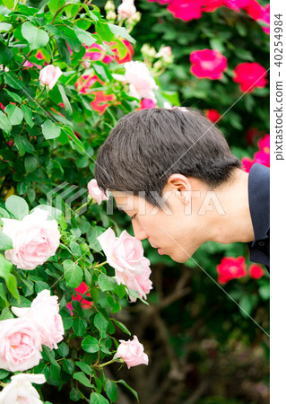 Men who smell the flower Men who smell the flower 40254984