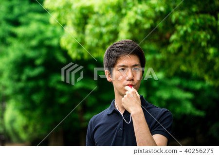 Man blowing whistle Man blowing whistle 40256275