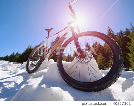 Mtb bike stays in snow. Winter snowy mountains Mtb bike stays in snow. Winter snowy mountains 40257301