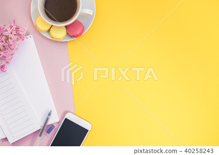 Creative flat lay with coffee cup and macaroons Creative flat lay with coffee cup and macaroons 40258243
