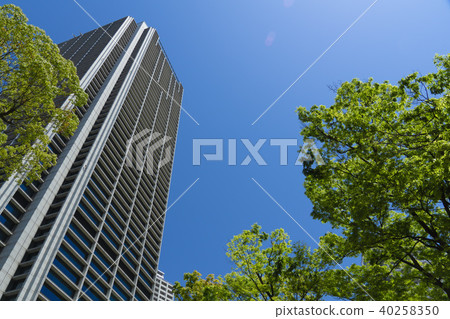 Blue sky fresh green skyscraper 40258350