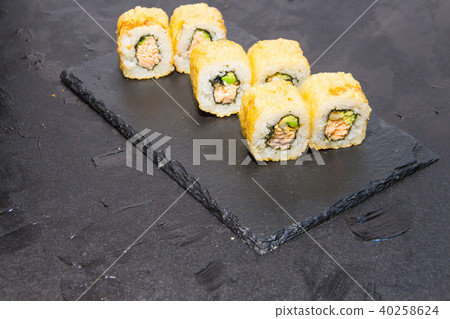 Hot Sushi roll with salmon. Japanese food. 40258624