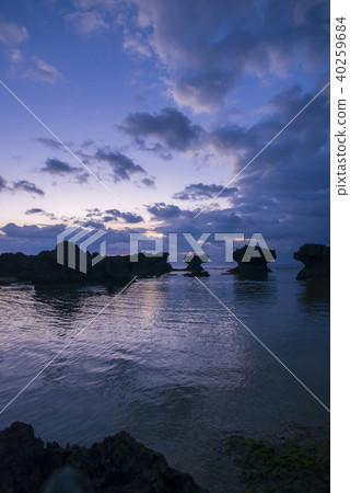 Okinerabu Island Ujiji beach shaped rock dawn 40259684