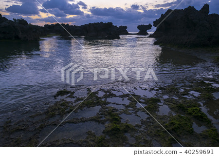 Okinerabu Island Ujiji beach shaped rock dawn Okinerabu Island Ujiji beach shaped rock dawn 40259691