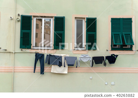 Clothes hanging from italian house in Genoa Clothes hanging from italian house in Genoa 40263882