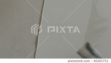 worker applying putty on the wall worker applying putty on the wall 40265752