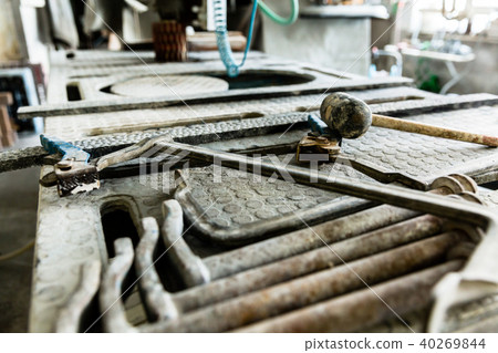 Workplace of stone carver with cramps and rubber hammer Workplace of stone carver with cramps and rubber hammer 40269844