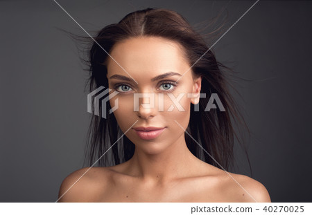 Groomed lady with streaming hair Groomed lady with streaming hair 40270025