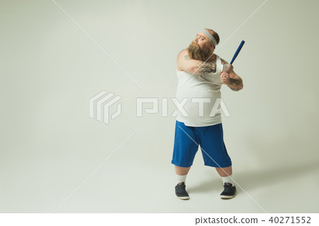 Scared thick guy is using club for defense Scared thick guy is using club for defense 40271552