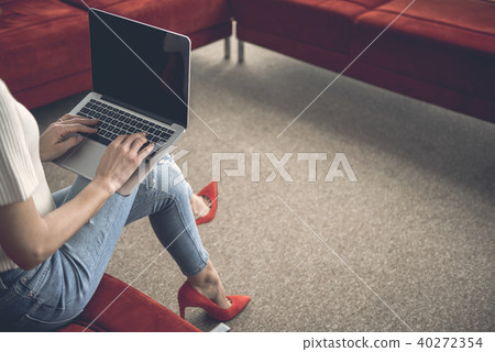 Female working with notebook computer 40272354