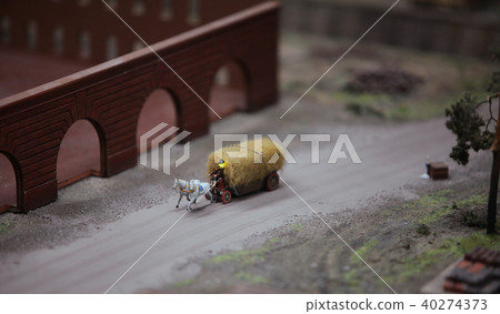 horse-drawn carriage with hay horse-drawn carriage with hay 40274373