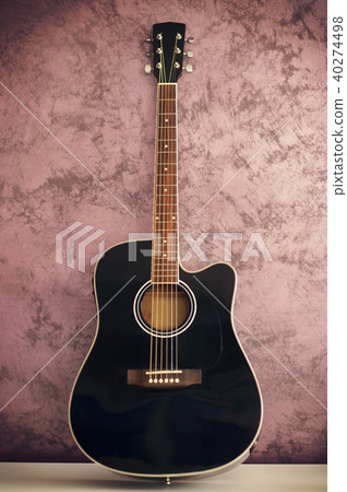 black acoustic guitar 40274498