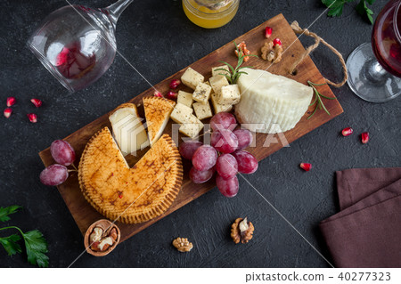 Cheese, fruit platter and wine 40277323