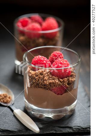 Chocolate dessert with raspberries 40277527