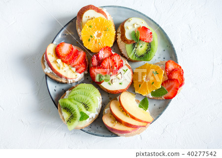 Fruit dessert sandwiches with ricotta cheese 40277542