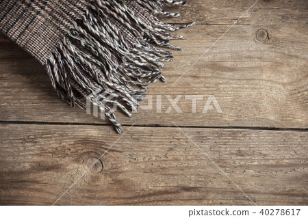 checkered plaid on wooden background checkered plaid on wooden background 40278617