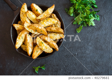 Baked potato wedges Baked potato wedges 40279681