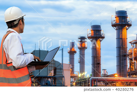 Engineer is check power plant by laptop Engineer is check power plant by laptop 40280276