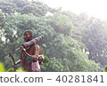 Statue monk of buddha standing on tree background 40281841