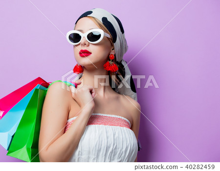 Woman with shopping bags 40282459