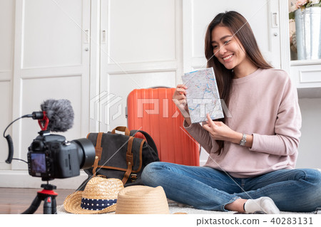 Asian young female blogger recording vlog video Asian young female blogger recording vlog video 40283131