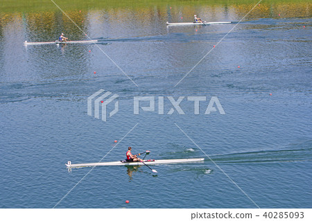 Rowers in a rowing boat on the race Rowers in a rowing boat on the race 40285093