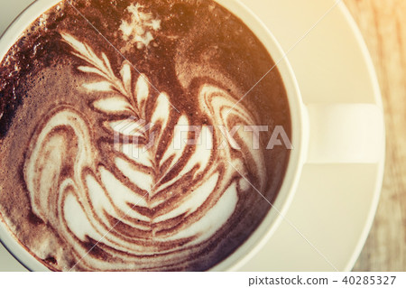 white cups of Cappuccino coffee with tree shaped milk foam. 40285327