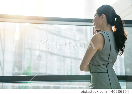 The business lady talking on the phone. The business lady talking on the phone. 40286304