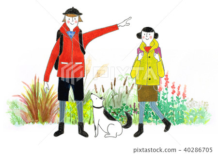 Parents and dogs enjoying hiking in nature 40286705