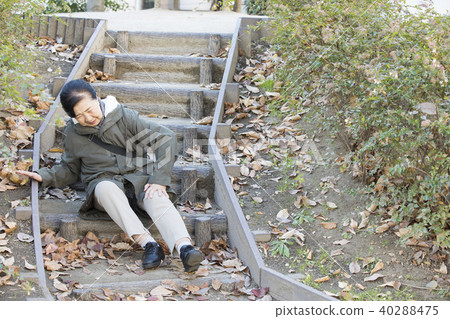 Elderly people who fell on the stairs, outdoors 40288475