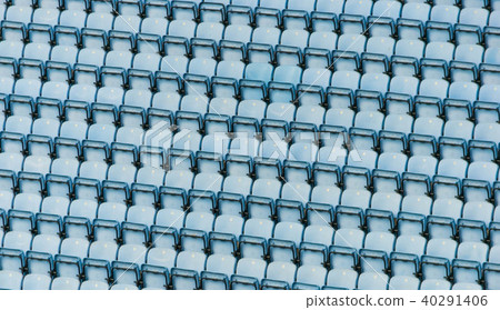 Rows of blue plastic stadium seats. Rows of blue plastic stadium seats. 40291406