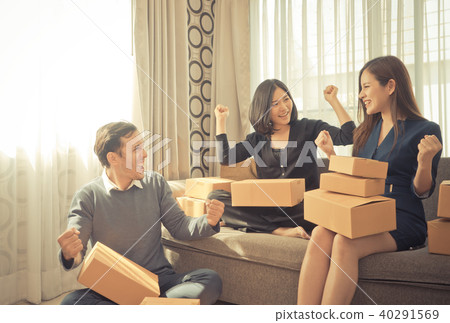 Friends team celebrating for their online business Friends team celebrating for their online business 40291569