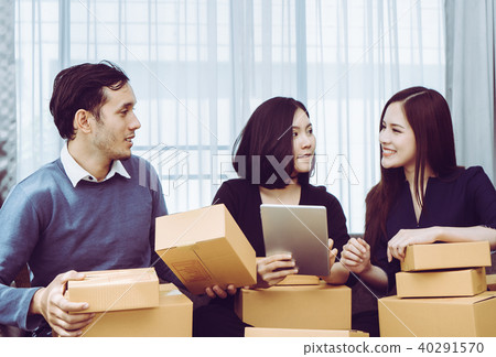 Business team checking stock in home business Business team checking stock in home business 40291570